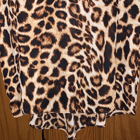 Everly Cheetah Leopard Print Flowy Peplum High Low V-Neck Sleeveless Blouse - Picture 9 of 16